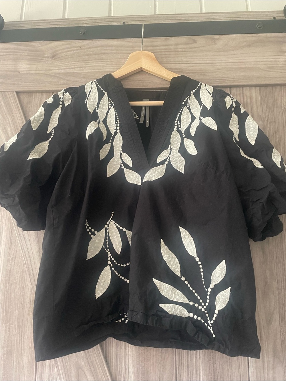 Anthropologie Black V-Neck Top with White Leaf Embroidery